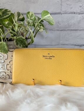 kate spade Yellow Pebbled Leather Zip Wallet